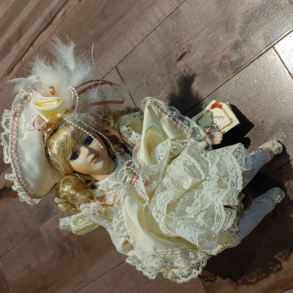 Collector’s‎ Choice 9” seated Musical Porcelain Victorian Doll
